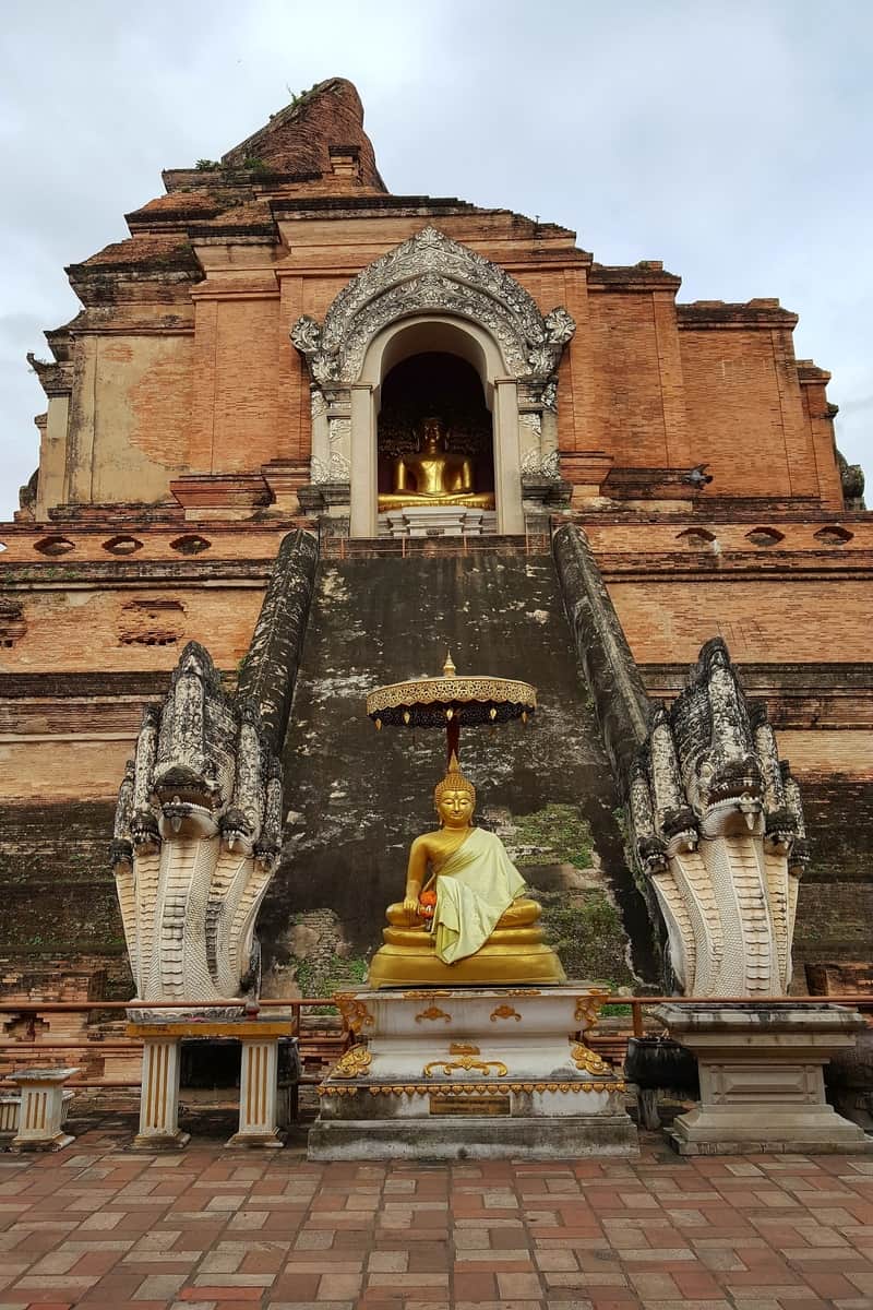 Ancient temple ruins with Buddha statues.