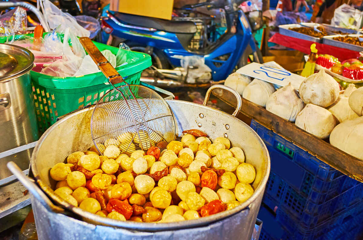 Asian night market with fried potatoes.