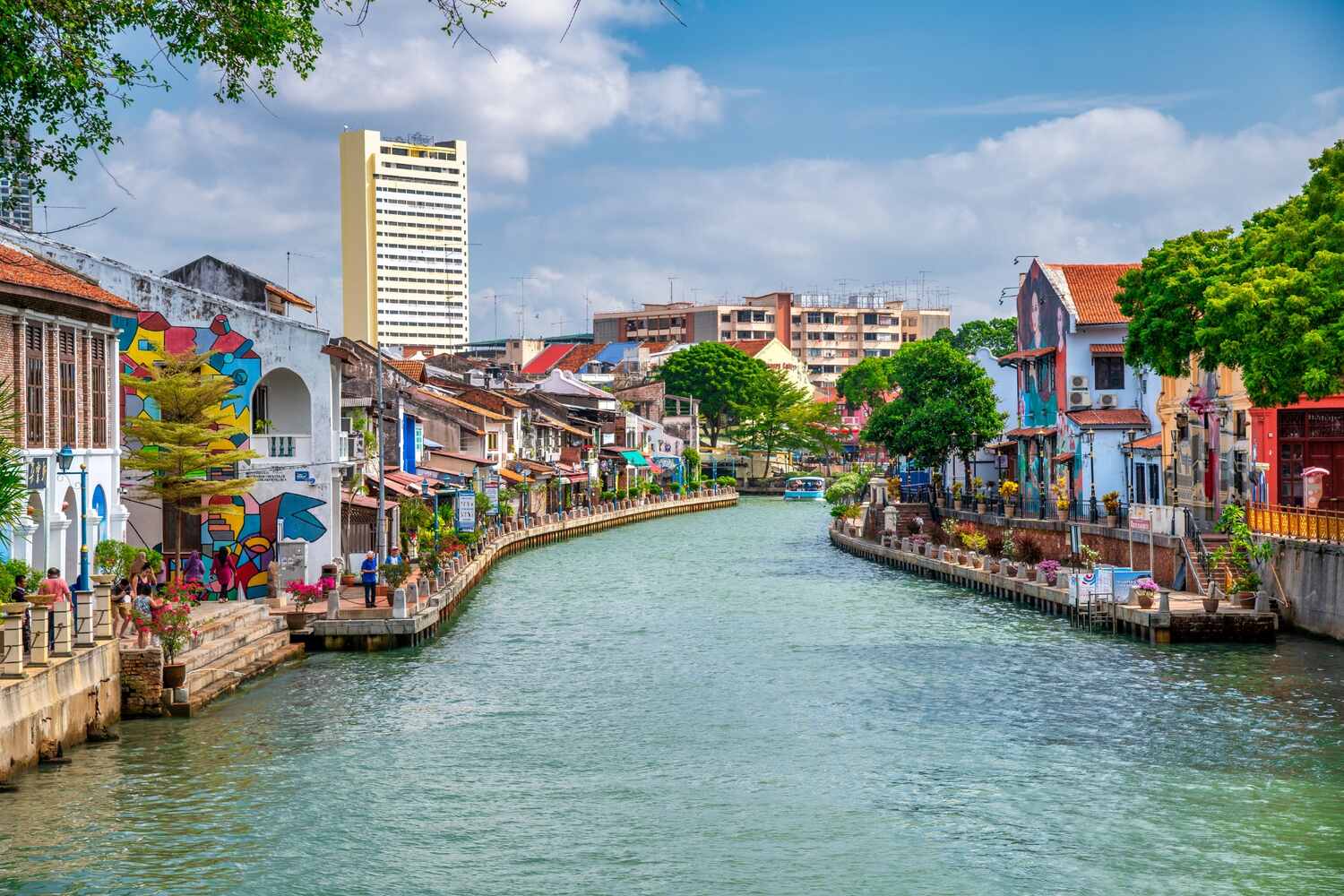 Urban canal with buildings and boats.