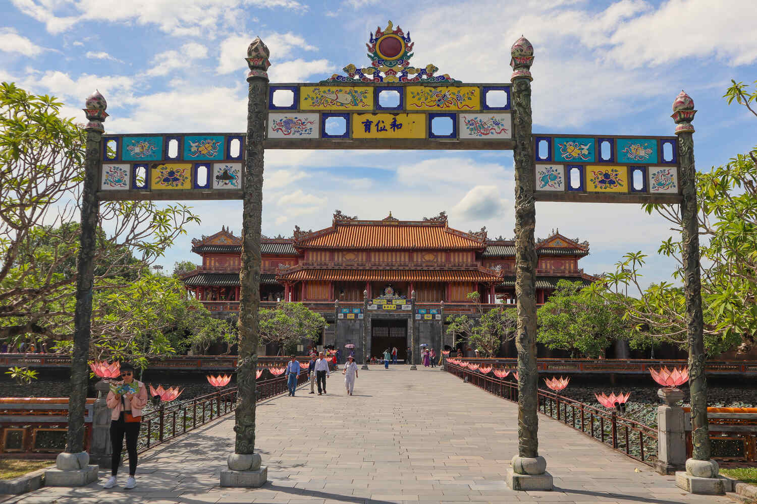 Decorative gateway at the Hue Imperial City with intricate blue and gold detailing.