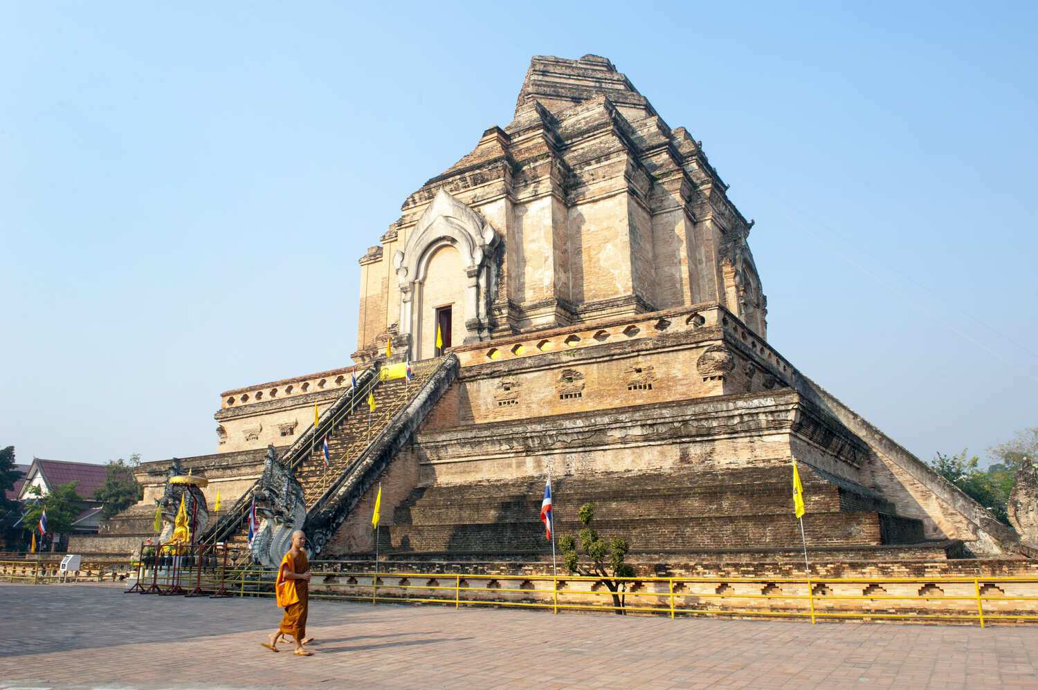 Wat Chedi Luang temple with a monk